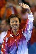 22 August 2004; China's Zhang Yining celebrates winning the Gold medal. Women's Singles Table Tennis Final, Zhang Yining, China v Kim Hyang Mi, Peoples Republic of Korea. Galatsi Indoor Hall. Games of the XXVIII Olympiad, Athens Summer Olympics Games 2004, Athens, Greece. Picture credit; Brendan Moran / SPORTSFILE
