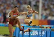 22 August 2004; Ireland's Derval O'Rourke (2137) in action during her 1st round heat of the Women's 100m Hurdles. Olympic Stadium. Games of the XXVIII Olympiad, Athens Summer Olympics Games 2004, Athens, Greece. Picture credit; Brendan Moran / SPORTSFILE