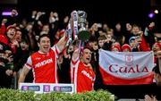 19 January 2025; Cuala captain James Power, left, Luke Keating of Cuala lift the Andy Merrigan Cup after their side's victory in the AIB GAA Football All-Ireland Senior Club Championship final match between Cuala and Errigal Ciarán at Croke Park in Dublin. Photo by Ben McShane/Sportsfile