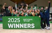 19 January 2025; The FloMAX Liffey Celtics players and staff celebrate with the trophy after their side's victory in the Basketball Ireland Paudie O'Connor National Cup final match between Killester and FloMAX Liffey Celtics at the National Basketball Arena in Tallaght, Dublin. Photo by Tyler Miller/Sportsfile