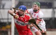 25 January 2025; Thomas Brady of Derry in action against Branán Molloy of Tyrone during the Allianz Hurling League Division 2 match between Tyrone and Derry at O'Neills Healy Park in Omagh, Tyrone. Photo by Ramsey Cardy/Sportsfile