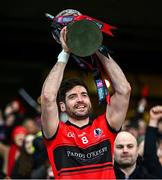 25 January 2025; An Cheathrú Rua captain Stiofán Ó Briain lifts the cup after the AIB GAA Football All-Ireland Junior Club Championship final match between An Cheathrú Rua of Galway and Naomh Padraig of Donegal at Croke Park in Dublin. Photo by Ray McManus/Sportsfile