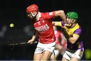 25 January 2025; Brian Hayes of Cork is tackled by Richie Lawlor of Wexford during the Allianz Hurling League Division 1A match between Wexford and Cork at Chadwicks Wexford Park in Wexford. Photo by Tom Beary/Sportsfile