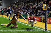 25 January 2025; Diarmuid Kilgallen of Munster scores a try during the United Rugby Championship match between Dragons and Munster at Rodney Parade in Newport, Wales. Photo by Kian Abdullah/Sportsfile