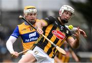 26 January 2025; Mikey Carey of Kilkenny is tackled by Seán Rynne of Clare during the Allianz Hurling League Division 1A match between Clare and Kilkenny at Cusack Park in Ennis, Clare. Photo by John Sheridan/Sportsfile