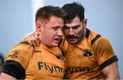 26 January 2025; Jack Horgan of Ashbourne, left, is congratulated by teammate Enda O'Brien, after scoring a try during the Bank of Ireland Provincial Towns Cup Round 1 match between Ashbourne RFC and Wexford Wanderers RFC at Milltown House in Ashbourne, Meath. Photo by Seb Daly/Sportsfile