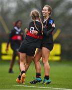 28 January 2025; Navya Nayak of The High School, right, celebrates with team-mate Zoe Sargent after scoring their side a try during the Bank of Ireland Leinster Rugby Girls Schools Senior Cup quarter-final match between St Mary's New Ross, Wexford and The High School, Dublin at Tullow RFC in Tullow, Carlow. Photo by Tyler Miller/Sportsfile