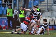 31 January 2025; Charlie Lyons of Belvedere College is tackled by Nathan Heatley of Wesley College during the Bank of Ireland Leinster Rugby Boys Schools Senior Cup first round match between Belvedere College and Wesley College at Energia Park in Dublin. Photo by Tyler Miller/Sportsfile