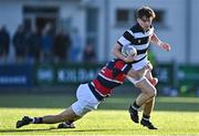 31 January 2025; Dylan Lord of Belvedere College is tackled by Nathan Heatley of Wesley College during the Bank of Ireland Leinster Rugby Boys Schools Senior Cup first round match between Belvedere College and Wesley College at Energia Park in Dublin. Photo by Tyler Miller/Sportsfile