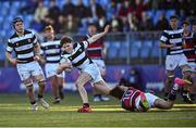 31 January 2025; Jonathon Garrihy of Belvedere College is tackled by Charlie Hempenstall of Wesley College during the Bank of Ireland Leinster Rugby Boys Schools Senior Cup first round match between Belvedere College and Wesley College at Energia Park in Dublin. Photo by Tyler Miller/Sportsfile