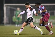 31 January 2025; Leo Gaxha of Dundalk in action against Thomas Oluwa of Drogheda United during the Jim Malone Cup match between Dundalk and Drogheda United at Oriel Park in Dundalk, Louth. Photo by Piaras Ó Mídheach/Sportsfile