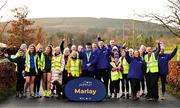 1 February 2025; Parkrun founder Paul Sinton-Hewitt and Vhi ambassador and Olympian David Gillick with Vhi staff and volunteers at the Marlay Park parkrun at Marlay Park in Dublin where Vhi hosted a special event to welcome parkrun founder Paul Sinton-Hewitt. Vhi ambassador and Olympian David Gillick was on hand to deliver a warm-up for all participants. parkrun in partnership with Vhi support local communities in organising free, weekly, timed 5km runs every Saturday at 9.30am. To register for a parkrun near you visit www.parkrun.ie. Photo by David Fitzgerald/Sportsfile