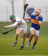 1 February 2025; Harry Doherty of St Flannans in action against  Euan Murray of Thurles CBSduring the Dr Harty Cup final match between Thurles CBS and St Flannans Ennis at Mallow GAA Complex in Cork. Photo by John Sheridan/Sportsfile