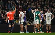 1 February 2025; Referee Ben O'Keeffe shows a yellow card to Marcus Smith of England during the Guinness Six Nations Rugby Championship match between Ireland and England at Aviva Stadium in Dublin. Photo by Sam Barnes/Sportsfile