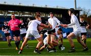 4 February 2025; Ryan Crawford of Newbridge College is tackled by Presentation College, Bray players Rory Hussman Byrne, left, and Conor McDonald during the Bank of Ireland Leinster Rugby Boys Schools Junior Cup First Round match between Newbridge College and Presentation College, Bray at Energia Park in Dublin. Photo by Shauna Clinton/Sportsfile