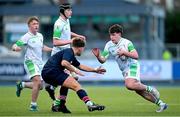 4 February 2025; Cian Dunne of Gonzaga College in action against Hlib Reznichenko of Wesley College during the Bank of Ireland Leinster Rugby Boys Schools Junior Cup First Round match between Wesley College and Gonzaga College at Energia Park in Dublin. Photo by Shauna Clinton/Sportsfile