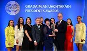 7 February 2025; The McGrath Family of Sarsfield GAA Club, Galway, are presented with the Dermot Early Family Award by Uachtarán Chumann Lúthchleas Gael Jarlath Burns and AIB chief customer officer Orlaith Ryan during the Gradaim an Uachtaráin at Croke Park in Dublin. Photo by Seb Daly/Sportsfile