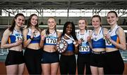 8 February 2025; Members of the gold medal winning Ratoath AC with their medals after winning the women's AAI National Indoor League at TUS Indoor Arena, Athlone in Westmeath. Photo by Sam Barnes/Sportsfile