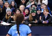 8 February 2025; Supporters await Leah Caffrey of Dublin after the Lidl Ladies National Football League Division 1 match between Dublin and Armagh at Parnell Park in Dublin. Photo by Stephen McCarthy/Sportsfile