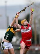 9 February 2025; Shea Cassidy of Derry and Dara Kearney of Kerry contest a dropping ball during the Allianz Hurling League Division 2 match between Kerry and Derry at Austin Stack Park in Tralee, Kerry. Photo by Brendan Moran/Sportsfile