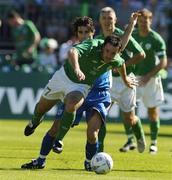 4 September 2004; Andy Reid, Republic of Ireland, in action against Marinos Satsias, Cyprus. FIFA World Cup Qualifier, Republic of Ireland v Cyprus, Lansdowne Road, Dublin. Picture credit; Pat Murphy / SPORTSFILE