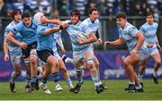 14 February 2025; Michael Walsh of Blackrock College is tackled by Owen Twomey of St Michael's College during the Bank of Ireland Leinster Rugby Boys Schools Senior Cup second round match between Blackrock College and St Michael's College at Energia Park in Dublin. Photo by Shauna Clinton/Sportsfile