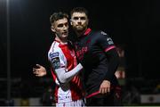 14 February 2025; Mason Melia of St Patrick's Athletic and Conor Keeley of Drogheda United after the SSE Airtricity Men's Premier Division match between St Patrick's Athletic and Drogheda United at Richmond Park in Dublin. Photo by Seb Daly/Sportsfile