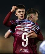 14 February 2025; Cian Murphy of Cobh Ramblers, 9, is congratulated by teammate David Bosjnak after scoring his sides third goal during the SSE Airtricity Men's First Division match between Treaty United and Cobh Ramblers at Markets Field in Limerick. Photo by Michael P Ryan/Sportsfile