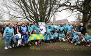 15 February 2025; Sanctuary Runners CEO and former Dublin footballer Michael Darragh MacAuley, former Kerry footballers David Moran, Tommy Walsh, Kieran Donaghy, Mike Quirke and current Kerry footballer Stefan Okunbor with a group of sanctuary runners after taking part in the Tralee Parkrun. Sanctuary Runners is a solidarity-through-sport movement which uses running, jogging and walking to bring together asylum seekers, refugees, migrants and all Irish residents and is supporting community integration in Trale, Killarney and Kenmare. For more information, email info@sanctuaryrunners.ie  Photo by Brendan Moran/Sportsfile