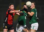 15 February 2025; Caolan Mooney of Down in action against Ciarán Caulfield, left, and Shane Walsh of Meath during the Allianz Football League Division 2 match between Down and Meath at Páirc Esler in Newry, Down. Photo by Stephen Marken/Sportsfile