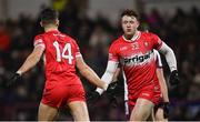 15 February 2025; Lachlan Murray, right, and Shane McGuigan of Derry during the Allianz Football League Division 1 match between Derry and Galway at Celtic Park in Derry. Photo by Ramsey Cardy/Sportsfile