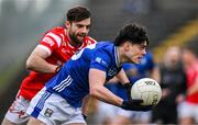 16 February 2025; Oisin Brady of Cavan in action against Dermot Campbell of Louth during the Allianz Football League Division 2 match between Cavan and Louth at Kingspan Breffni Park in Cavan. Photo by Ray McManus/Sportsfile