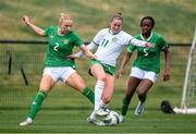 19 February 2025; Erin McLaughlin of Republic of Ireland Women's Development Team, centre, is tackled by Grace Fitzpatrick, left, and Mary Phillips, right, of Republic of Ireland Women's U19's during a training match between Republic of Ireland Women's Development Team and Republic of Ireland Women's U19's at the FAI National Training Centre in Abbotstown, Dublin. Photo by Stephen McCarthy/Sportsfile