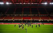 21 February 2025; Wales players warm-up during a Wales Rugby captain's run at the Principality Stadium in Cardiff, Wales. Photo by Seb Daly/Sportsfile