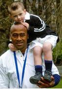 21 February 2025; (EDITORS NOTE: FILE PHOTO 16/01/2003) The late New Zealand rugby great Jonah Lomu with a then four-year-old Dan Sheehan, who will captain Ireland against Wales in the Guinness Six Nations Rugby Championship this weekend, at the launch of the Ballygowan one litre Sports Pack in St. Stephen's Green, Dublin. Photo by Pat Murphy/Sportsfile