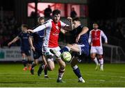 3 March 2025; Aidan Keena of St Patrick's Athletic is fouled by Adam O'Reilly of Derry City resulting in St Patrick's Athletic being awarded a second penalty during the SSE Airtricity Men's Premier Division match between St Patrick's Athletic and Derry City at Richmond Park in Dublin Photo by Stephen McCarthy/Sportsfile