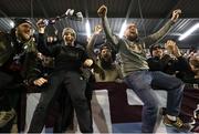 3 March 2025; Drogheda United supporters celebrate after the SSE Airtricity Men's Premier Division match between Bohemians and Drogheda United at Dalymount Park in Dublin. Photo by Thomas Flinkow/Sportsfile