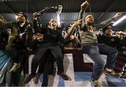 3 March 2025; Drogheda United supporters celebrate after the SSE Airtricity Men's Premier Division match between Bohemians and Drogheda United at Dalymount Park in Dublin. Photo by Thomas Flinkow/Sportsfile