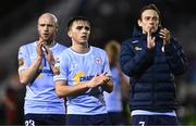 3 March 2025; Shelbourne players, from left, Kerr McInroy, James Norris and Harry Wood applaud to the supporters after their drawn SSE Airtricity Men's Premier Division match between Galway United and Shelbourne at Eamonn Deacy Park in Galway. Photo by Ben McShane/Sportsfile