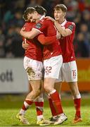 3 March 2025; Sligo Rovers players, from left, John Mahon, Gareth McElroy and Ollie Denham celebrate after their side's victory in the SSE Airtricity Men's Premier Division match between Sligo Rovers and Shamrock Rovers at The Showgrounds in Sligo. Photo by Piaras Ó Mídheach/Sportsfile