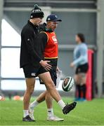 4 March 2025; Sam Prendergast, left, and assistant coach Andrew Goodman during an Ireland Rugby squad training session at the IRFU High Performance Centre in Dublin. Photo by Brendan Moran/Sportsfile