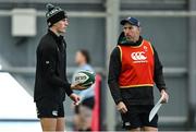 4 March 2025; Sam Prendergast, left, and assistant coach Andrew Goodman during an Ireland Rugby squad training session at the IRFU High Performance Centre in Dublin. Photo by Brendan Moran/Sportsfile