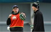 4 March 2025; Sam Prendergast, right, and assistant coach Andrew Goodman during an Ireland Rugby squad training session at the IRFU High Performance Centre in Dublin. Photo by Brendan Moran/Sportsfile