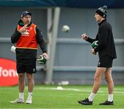 4 March 2025; Sam Prendergast, right, and assistant coach Andrew Goodman during an Ireland Rugby squad training session at the IRFU High Performance Centre in Dublin. Photo by Brendan Moran/Sportsfile