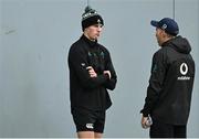 4 March 2025; Sam Prendergast, left, and assistant coach Andrew Goodman during an Ireland Rugby squad training session at the IRFU High Performance Centre in Dublin. Photo by Brendan Moran/Sportsfile