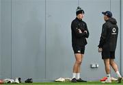 4 March 2025; Sam Prendergast, left, and assistant coach Andrew Goodman during an Ireland Rugby squad training session at the IRFU High Performance Centre in Dublin. Photo by Brendan Moran/Sportsfile