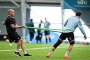 4 March 2025; Physiotherapist Peter Scullion, left, and Caelan Doris during an Ireland Rugby squad training session at the IRFU High Performance Centre in Dublin. Photo by Brendan Moran/Sportsfile