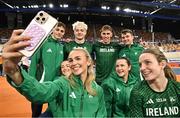 5 March 2025; Sharlene Mawdsley of Ireland, centre, takes a selfie with teammates from left, David Bosch, Lauren Cadden, Conor Kelly, Cathal Doyle, Phil Healy, Marcus Lawler and Rachel McCann during a training session at the Omnisport Apeldoorn in Apeldoorn, Netherlands, ahead of the European Athletics Indoor Championships 2025. Photo by Sam Barnes/Sportsfile