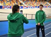 5 March 2025; David Bosch of Ireland, right, has his photograph taken by teammate Phil Healy during a training session at the Omnisport Apeldoorn in Apeldoorn, Netherlands, ahead of the European Athletics Indoor Championships 2025. Photo by Sam Barnes/Sportsfile