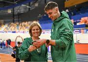 5 March 2025; Cathal Doyle of Ireland with coach Noelle Morrissey during a training session at the Omnisport Apeldoorn in Apeldoorn, Netherlands, ahead of the European Athletics Indoor Championships 2025. Photo by Sam Barnes/Sportsfile